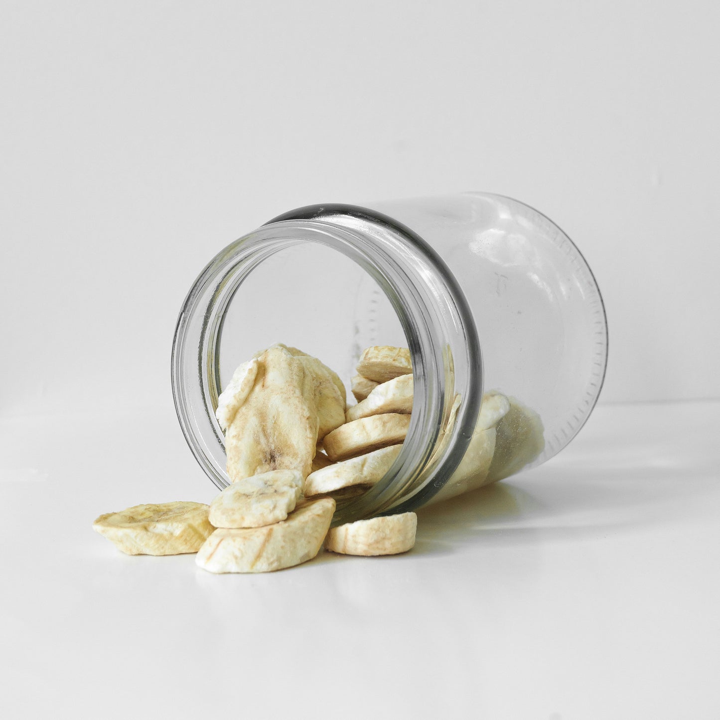 Crunchy, sweet freeze dried bananas in a glass jar